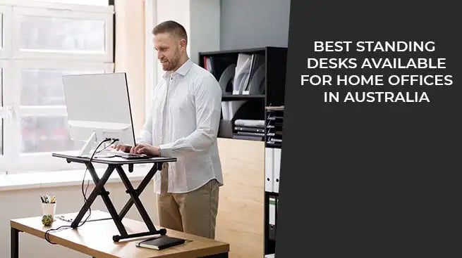 Man using adjustable standing desk setup in a modern Australian home office