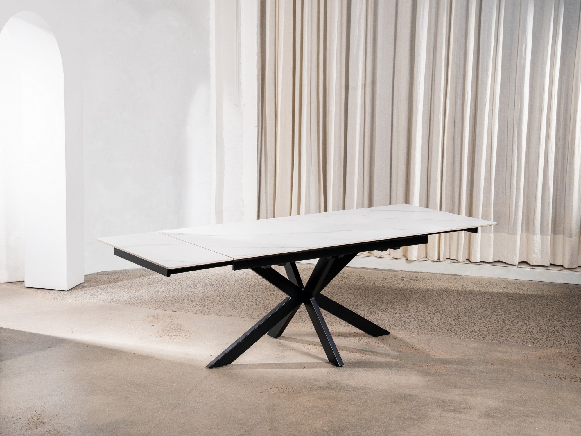 Newcastle Extension Dining Table – Snow White Marble Effect | Black Cross Leg Frame