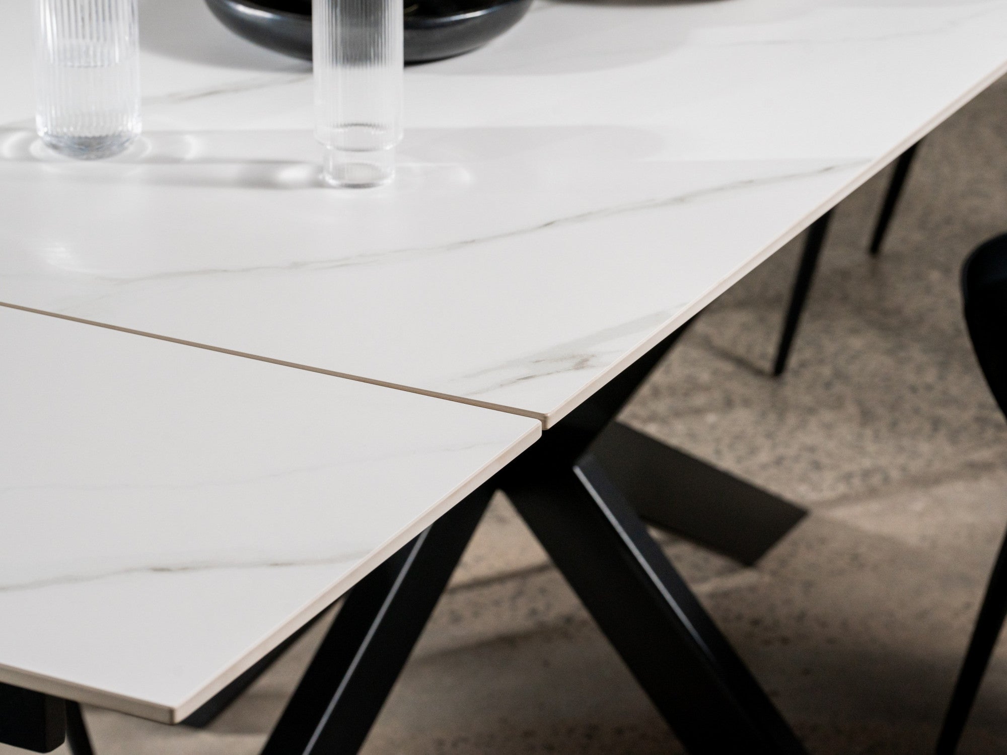 Newcastle Extension Dining Table – Snow White Marble Effect | Black Cross Leg Frame