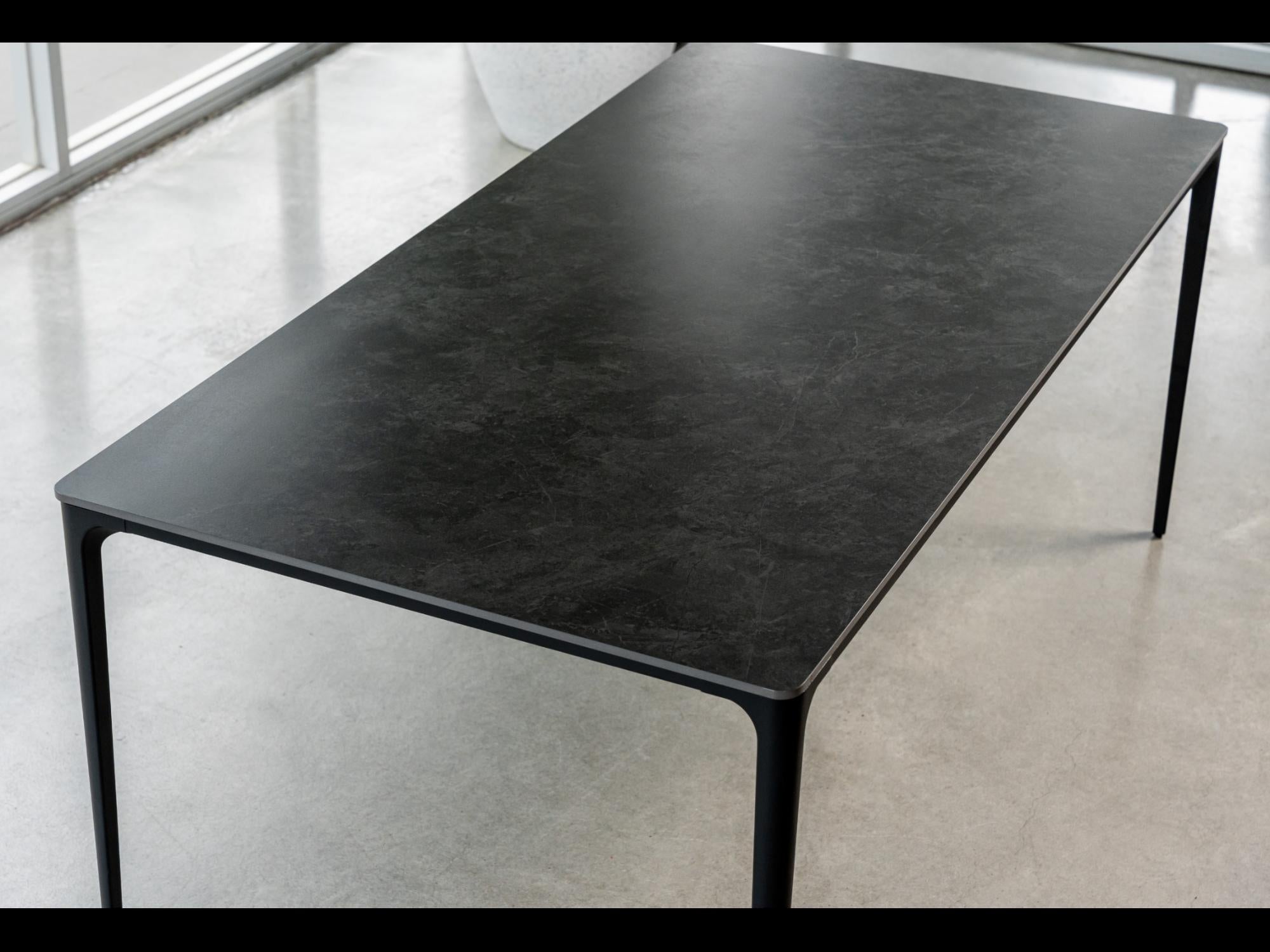 Magnate Dining Table – Grey Stone Ceramic | Black Frame