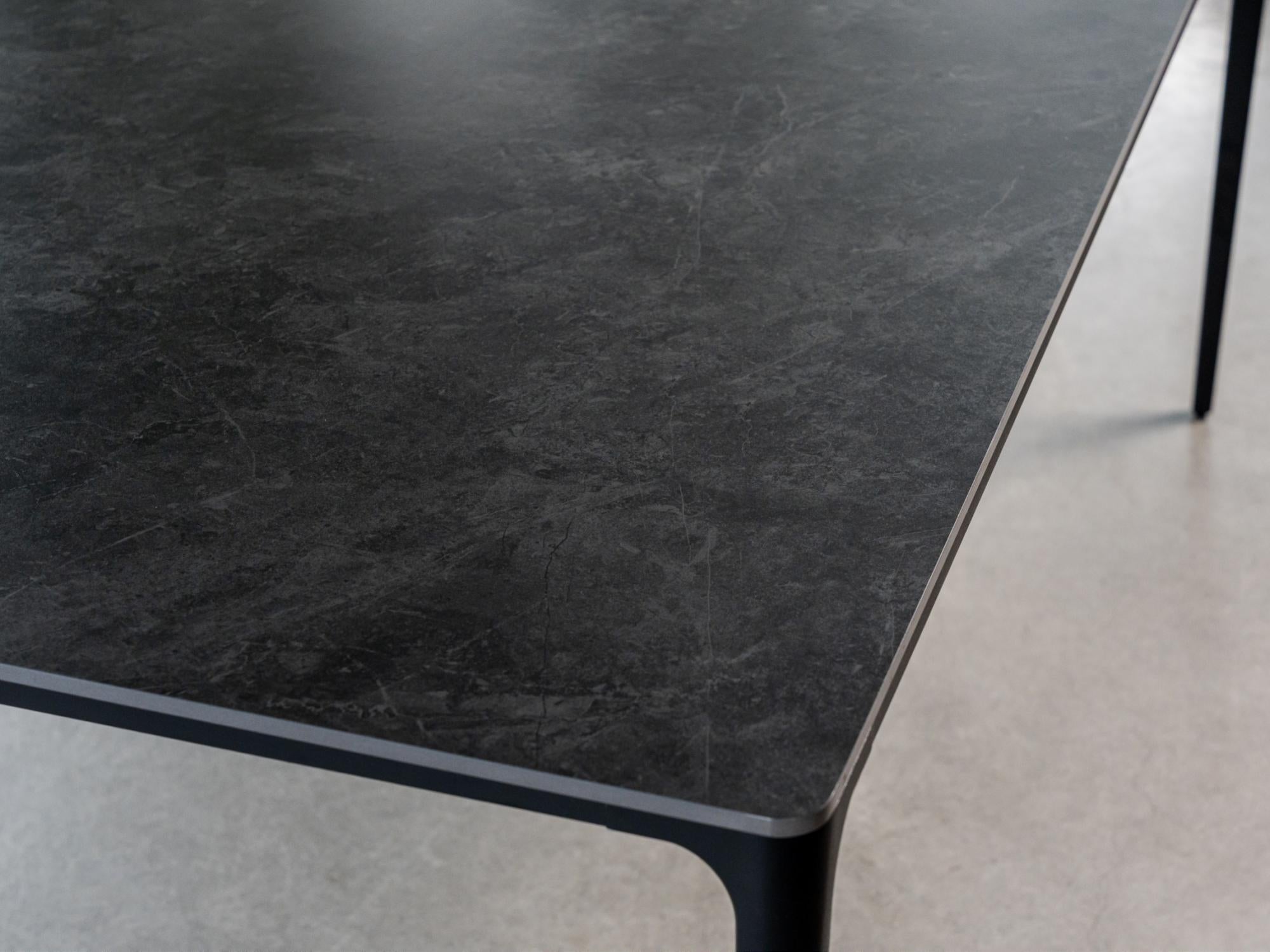 Magnate Dining Table – Grey Stone Ceramic | Black Frame