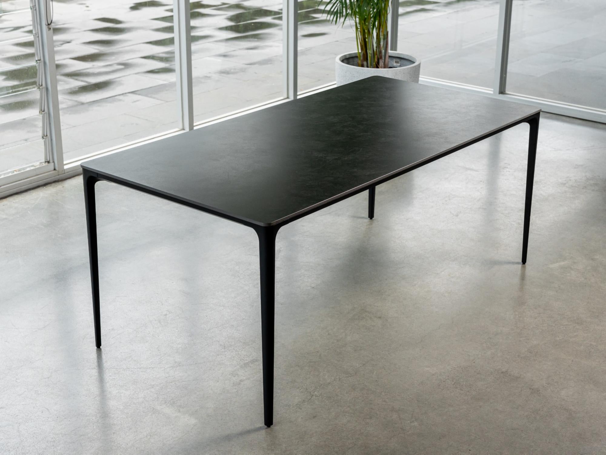 Magnate Dining Table – Grey Stone Ceramic | Black Frame